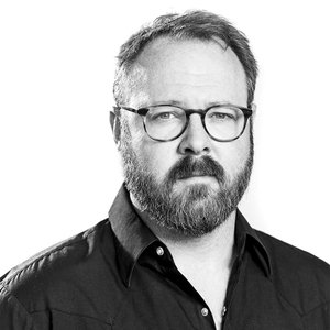 Black and white headshot of Keith Maitland